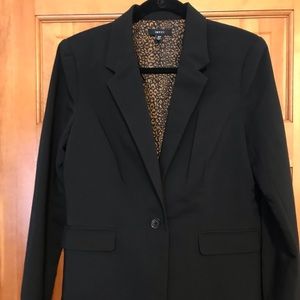 Leopard print lined black blazer.